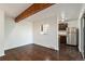 Cozy dining area with hardwood floors, and a pass-through to the kitchen at 1233 S Yosemite Way # 74, Denver, CO 80247