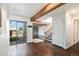 Open floor plan featuring hardwood floors, natural light, and access to the patio at 1233 S Yosemite Way # 74, Denver, CO 80247