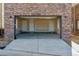 Spacious two-car garage with brick facade at 11487 E Briarwood Cir, Centennial, CO 80112