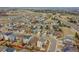 An aerial view showcases homes in a neighborhood setting at 1706 Ghost Dance Cir, Castle Rock, CO 80108