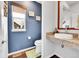 Stylish powder room featuring a vessel sink, granite countertop, and wood-look floors at 1706 Ghost Dance Cir, Castle Rock, CO 80108