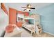 Charming bedroom features bunk beds, and colorful accents at 1706 Ghost Dance Cir, Castle Rock, CO 80108