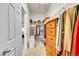 Spacious walk-in closet featuring shelving, rods for hanging, and a built-in safe at 1706 Ghost Dance Cir, Castle Rock, CO 80108