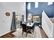 Bright dining room with soaring ceilings and backyard access at 1706 Ghost Dance Cir, Castle Rock, CO 80108