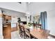 Open concept dining space with views of the kitchen and living room at 1706 Ghost Dance Cir, Castle Rock, CO 80108