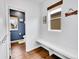 Mudroom and half bath with lots of natural light and modern design at 1706 Ghost Dance Cir, Castle Rock, CO 80108