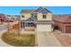 Charming two-story home featuring a two-car garage and well-maintained landscaping at 1706 Ghost Dance Cir, Castle Rock, CO 80108