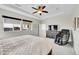 Bedroom with a comfortable bed, sitting area, and neutral colors at 1706 Ghost Dance Cir, Castle Rock, CO 80108