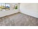 This bedroom features neutral walls, carpet, and windows to allow for natural light at 16750 E Ada Pl, Aurora, CO 80017