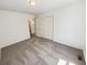 Bedroom featuring neutral carpet, window, and closet at 16750 E Ada Pl, Aurora, CO 80017