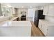 Modern kitchen with stainless steel appliances, ample cabinet space, and bright countertops at 16750 E Ada Pl, Aurora, CO 80017
