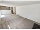 Open-concept living room with lots of natural light and a fireplace at 16750 E Ada Pl, Aurora, CO 80017