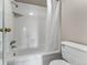 Clean bathroom with shower/tub combo and updated fixtures at 130 N Pearl St # 805, Denver, CO 80203