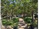 Landscaped walkway shaded by lush trees at 130 N Pearl St # 805, Denver, CO 80203