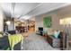 Spacious living room with open floor plan and view into dining area and kitchen at 130 N Pearl St # 805, Denver, CO 80203