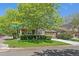 Charming single Gathering home on a corner lot featuring mature trees and beautiful landscaping at 6673 S Benton St, Littleton, CO 80123