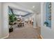 Bright and airy living area open to dining, featuring fresh paint and abundant natural light at 6673 S Benton St, Littleton, CO 80123