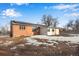 Large backyard with detached workshop and solar panels at 153 S Pierce St, Lakewood, CO 80226