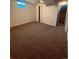 Spacious finished basement with neutral carpeting at 153 S Pierce St, Lakewood, CO 80226