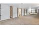 Large finished basement with neutral carpeting at 153 S Pierce St, Lakewood, CO 80226