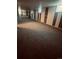 Large finished basement area with neutral carpeting at 153 S Pierce St, Lakewood, CO 80226