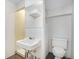 Simple bathroom with a sink, toilet, and an unfinished shower stall at 153 S Pierce St, Lakewood, CO 80226