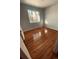 Bright bedroom featuring hardwood floors and a window at 153 S Pierce St, Lakewood, CO 80226