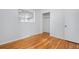 Bedroom featuring hardwood floors and a closet at 153 S Pierce St, Lakewood, CO 80226