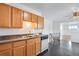 Functional kitchen with ample cabinet space and stainless steel sink overlooking the dining area at 153 S Pierce St, Lakewood, CO 80226