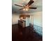 Eat-in kitchen with dark flooring and ceiling fan at 153 S Pierce St, Lakewood, CO 80226