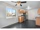 View of kitchen with stainless steel appliances and wood cabinets at 153 S Pierce St, Lakewood, CO 80226