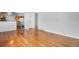 Bright living room featuring pristine hardwood floors and an open layout at 153 S Pierce St, Lakewood, CO 80226