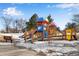 Colorful playground with slides and climbing structures at 153 S Pierce St, Lakewood, CO 80226