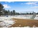 Tennis courts surrounded by a chain link fence at 153 S Pierce St, Lakewood, CO 80226