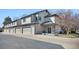 Exterior view of the two story home with a three car garage at 4301 S Pierce St # 6D, Littleton, CO 80123