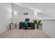 Dedicated home office space with a desk and chair, illuminated by modern sconces at 4301 S Pierce St # 6D, Littleton, CO 80123