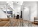 Bright and airy living room with high ceilings, hardwood floors, dining area, and abundant natural light at 4301 S Pierce St # 6D, Littleton, CO 80123