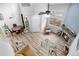 High angle shot of living area with open concept floor plan, modern decor and stone fireplace at 4301 S Pierce St # 6D, Littleton, CO 80123