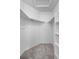 Well-lit walk-in closet with multiple shelves for optimized storage and organization at 4301 S Pierce St # 6D, Littleton, CO 80123