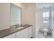 Clean bathroom featuring a vanity, toilet, and bathtub at 210 Paloma Way, Elizabeth, CO 80107