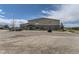 Exterior view of the Elizabeth Library building with a large parking lot at 210 Paloma Way, Elizabeth, CO 80107