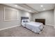 Neutral bedroom with carpet, recessed lighting, with dark wood dresser, and large window at 10188 Stephen Pl, Highlands Ranch, CO 80130