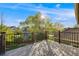 Large backyard deck with metal railings provides the perfect spot for relaxation at 10188 Stephen Pl, Highlands Ranch, CO 80130