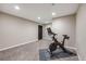 Bright exercise room with recessed lighting and space for exercise equipment at 10188 Stephen Pl, Highlands Ranch, CO 80130