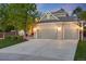 Charming brick home boasts a spacious three-car garage and beautifully landscaped front yard at 10188 Stephen Pl, Highlands Ranch, CO 80130