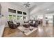 Bright living room with vaulted ceilings and ample seating, ideal for Gathering gatherings at 10188 Stephen Pl, Highlands Ranch, CO 80130