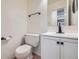 Small bathroom features a white vanity, black fixtures, and tile flooring at 14462 E Mississippi Ave # B, Aurora, CO 80012