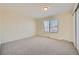 Bedroom with neutral carpet, a window with blinds, and baseboard vents at 14462 E Mississippi Ave # B, Aurora, CO 80012