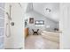 Bright bathroom showcasing a tub with tiled surround, vanity, and walk-in shower at 3308 S Birch St, Denver, CO 80222