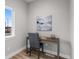 Bright home office with desk, chair, and natural light at 2140 S Ash St # 102, Denver, CO 80222